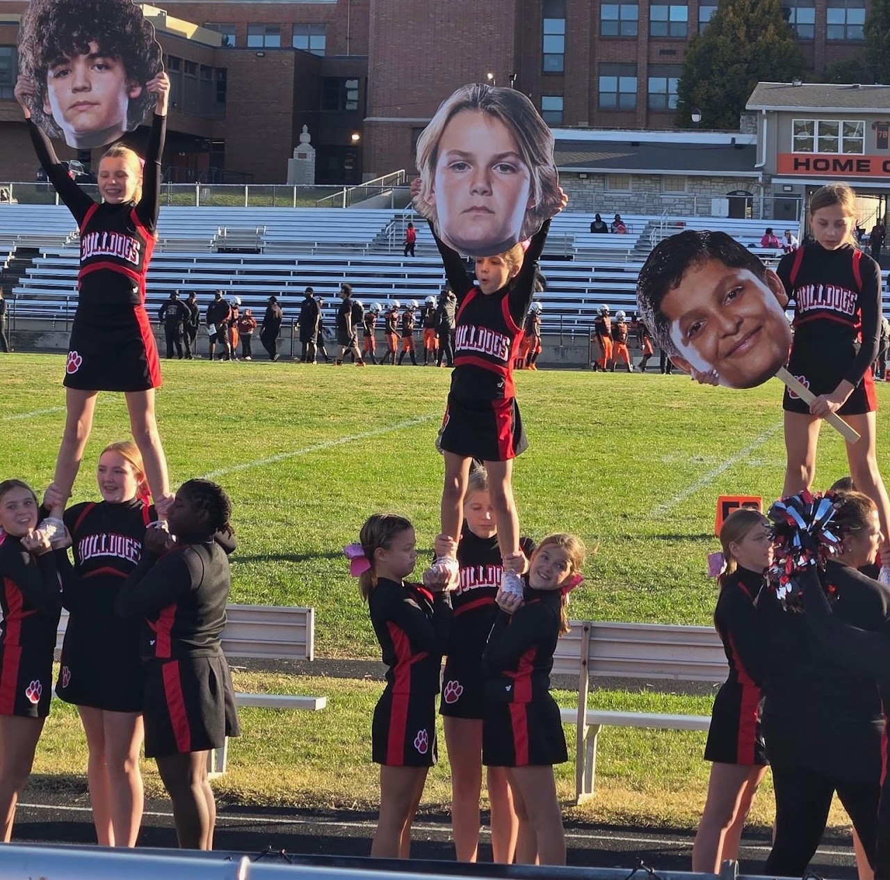 Junior Bulldogs cheerleaders performing a spirited game-day routine