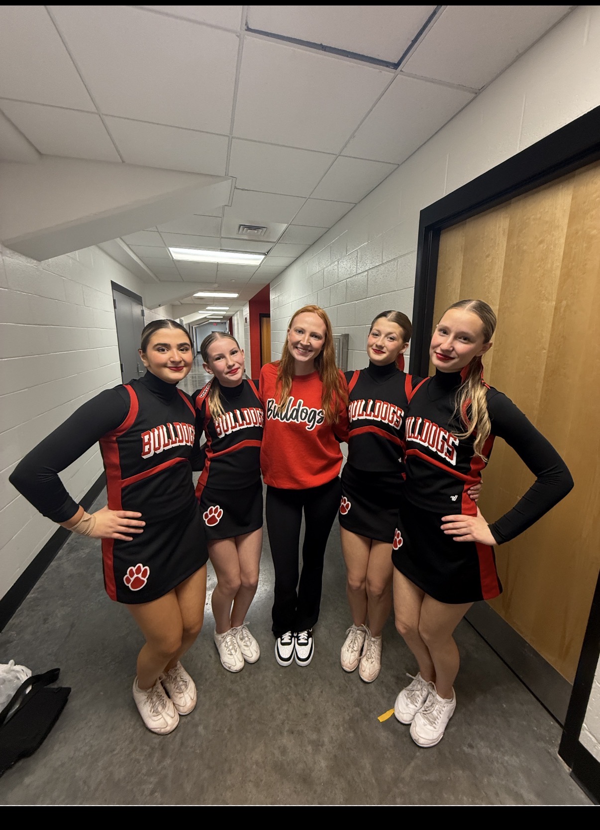 Grace Urban with Junior Bulldogs cheerleaders